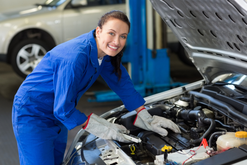 Mechanic working under the hood